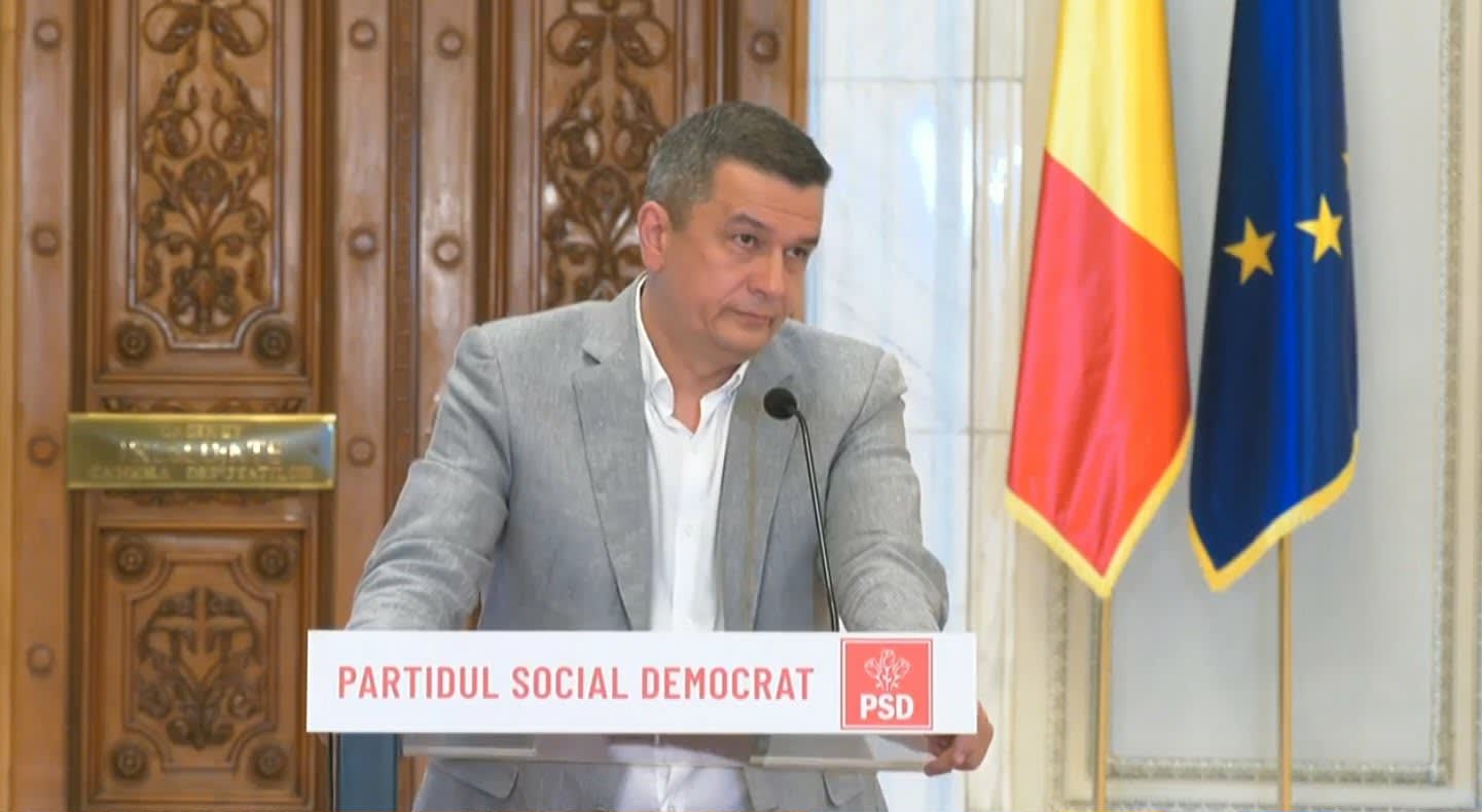 Sorin Grindeanu și Petrișor Peiu în dezbatere parlamentară