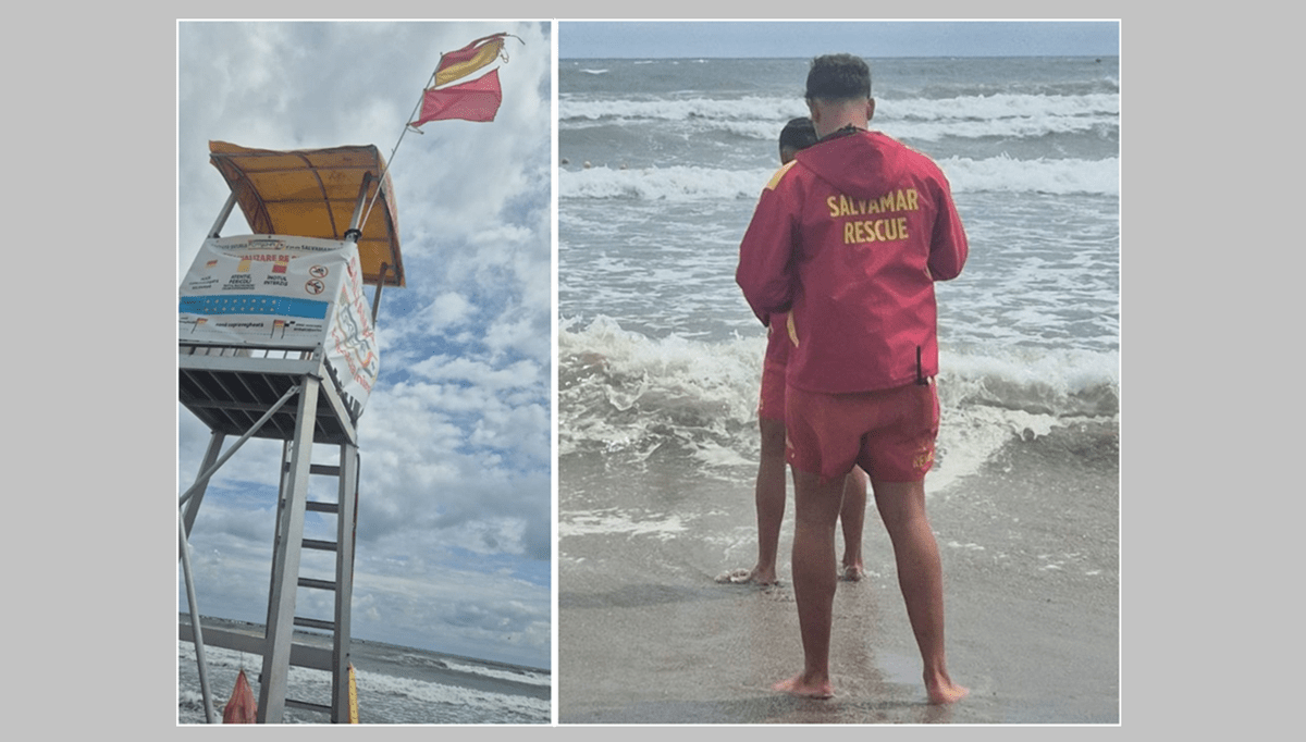 Salvamari arborând steagul roșu pe plaja Mamaia în condiții de vânt puternic