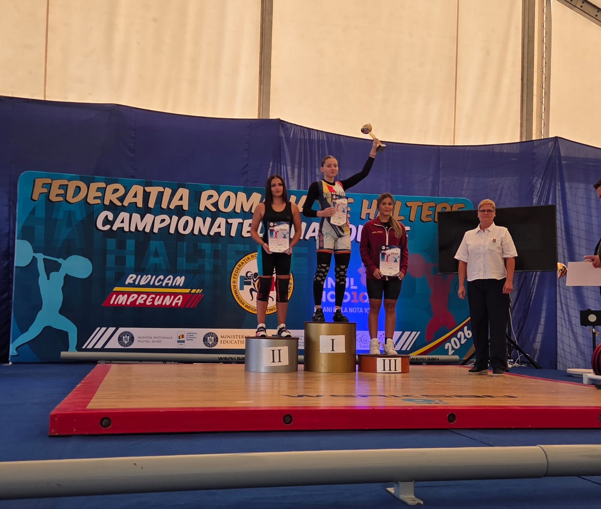 Sportivi haltere de la CSM Timișoara în timpul competiției Sportivi haltere de la CSM Timișoara în timpul competiției