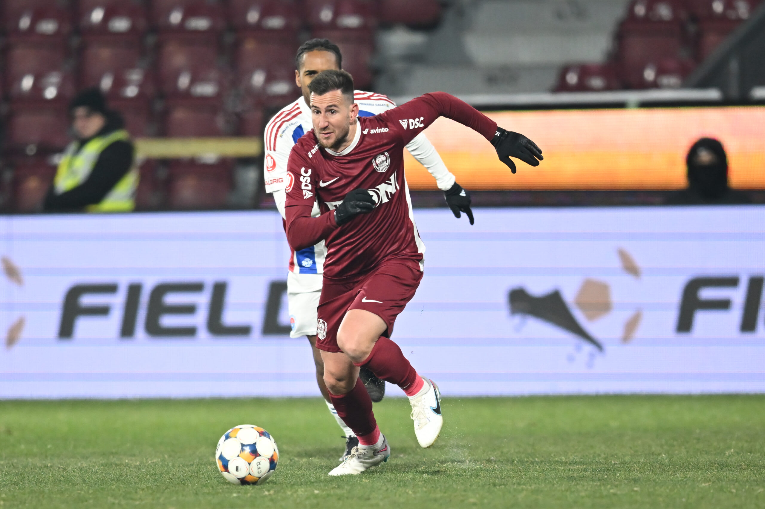 Jucători CFR Cluj în meci de fotbal Jucători CFR Cluj în meci de fotbal