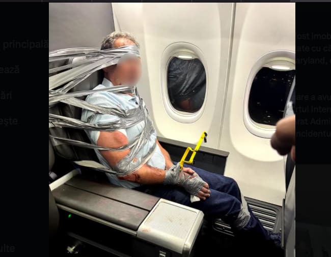Un pasager agresiv legat cu bandă adezivă pe scaunul avionului în zborul American Airlines