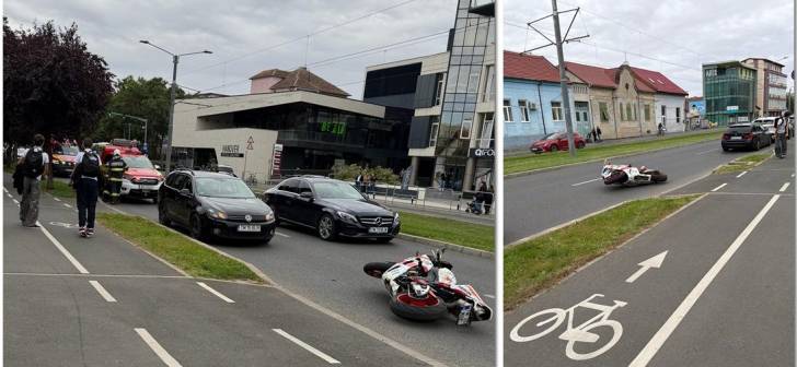 Motociclist căzând pe asfalt în Timișoara Motociclist căzând pe asfalt în Timișoara