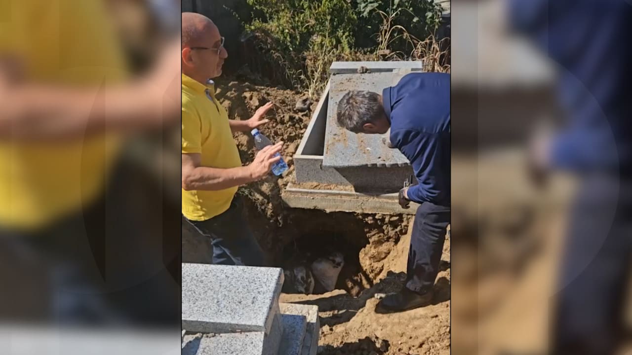 Rămășițele a 20 de persoane, descoperite într-o criptă falsă din cimitir, și dosar penal pentru profanare