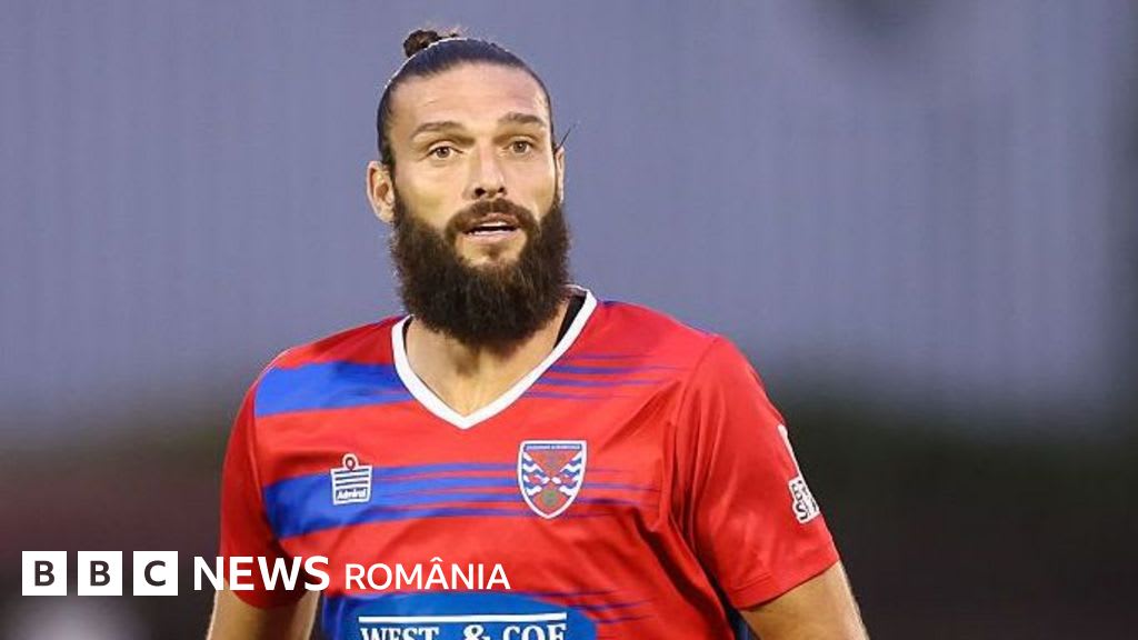 Andy Carroll în timpul unui meci de fotbal Andy Carroll în timpul unui meci de fotbal