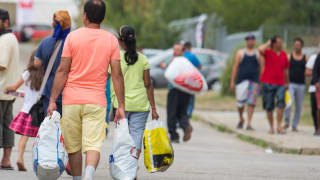 români în Germania primind ajutoare sociale