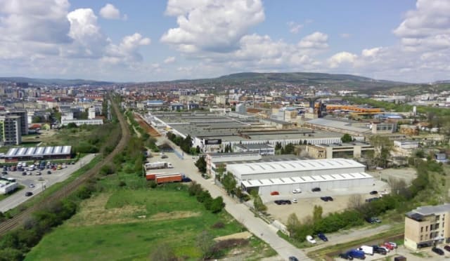 Familia Căpușan intenționează să preia terenul de la mall-ul Sanex, iar Consiliul Concurenței analizează tranzacția