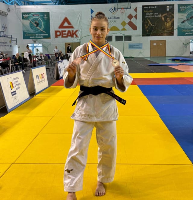 judoka Daria Kraus pe tatami, medalii de aur și argint
