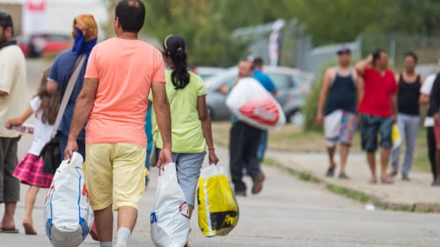 români în Germania primind ajutoare sociale