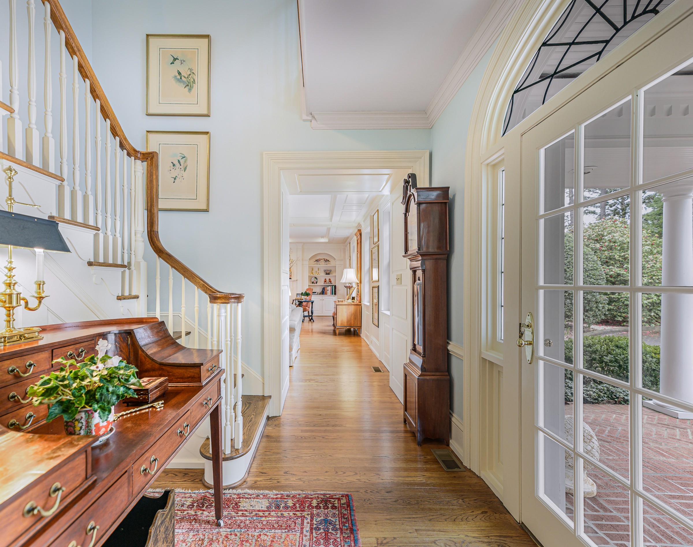The entrance hall, looking to the front door and the circular drive
