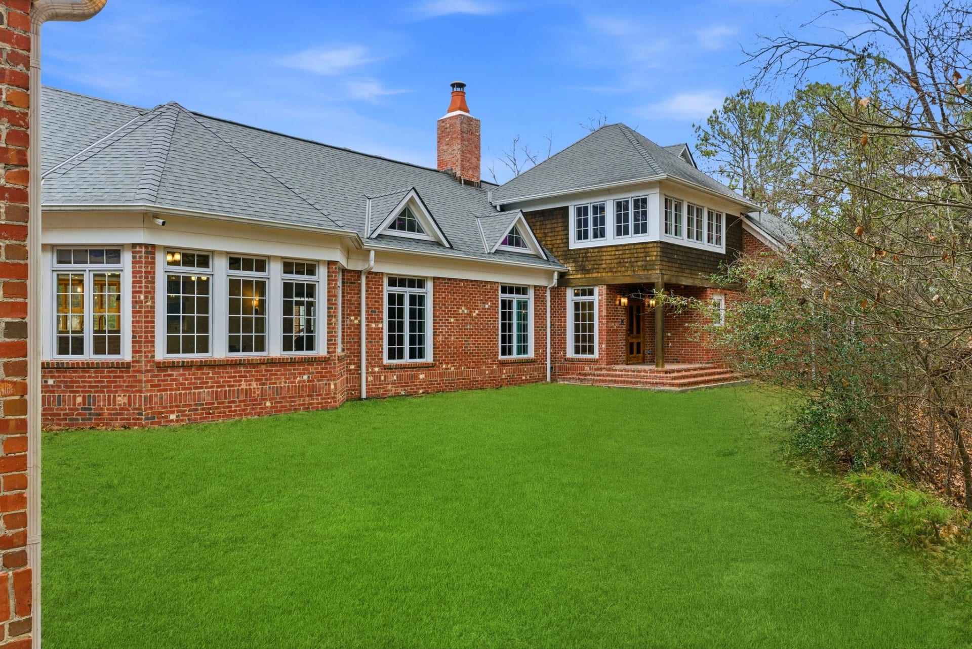 The approach — full brick and copper detailing