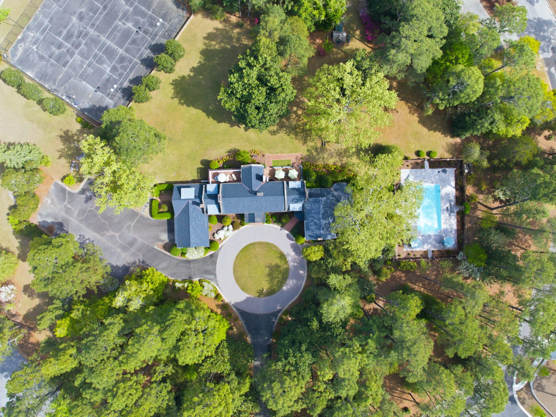 Garran Hill from above, alone in its own circle of trees