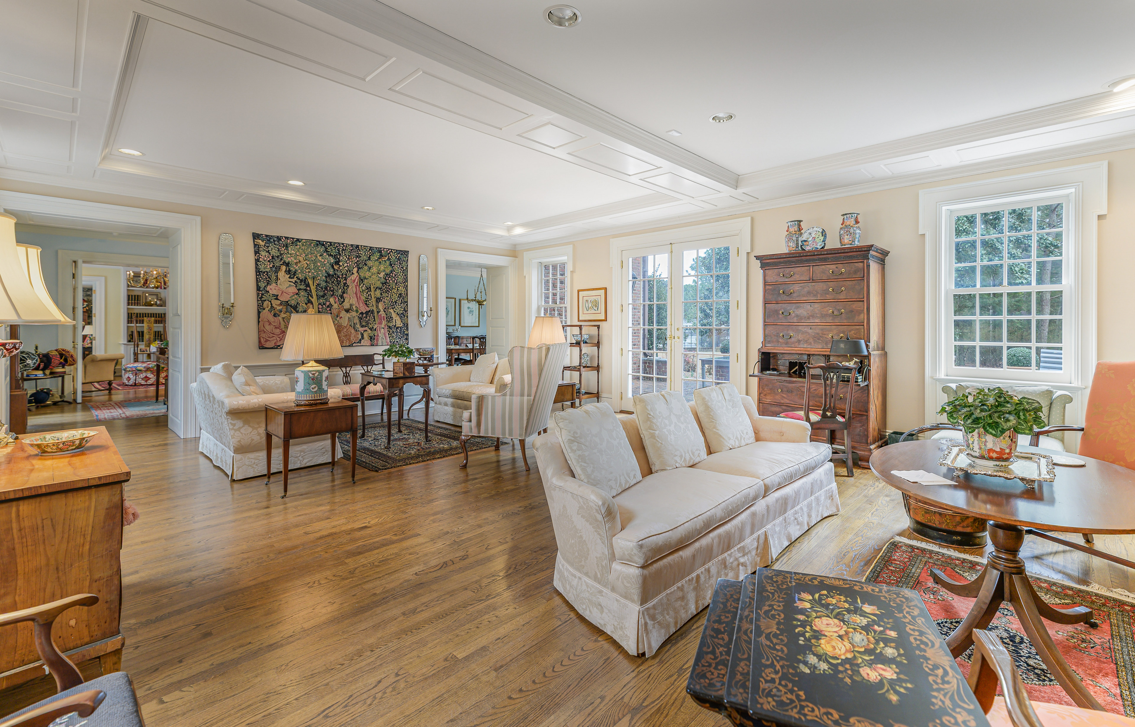 Garran Hill drawing room &mdash; nearly forty feet, Federal mantel at the far end, French doors to the brick terrace