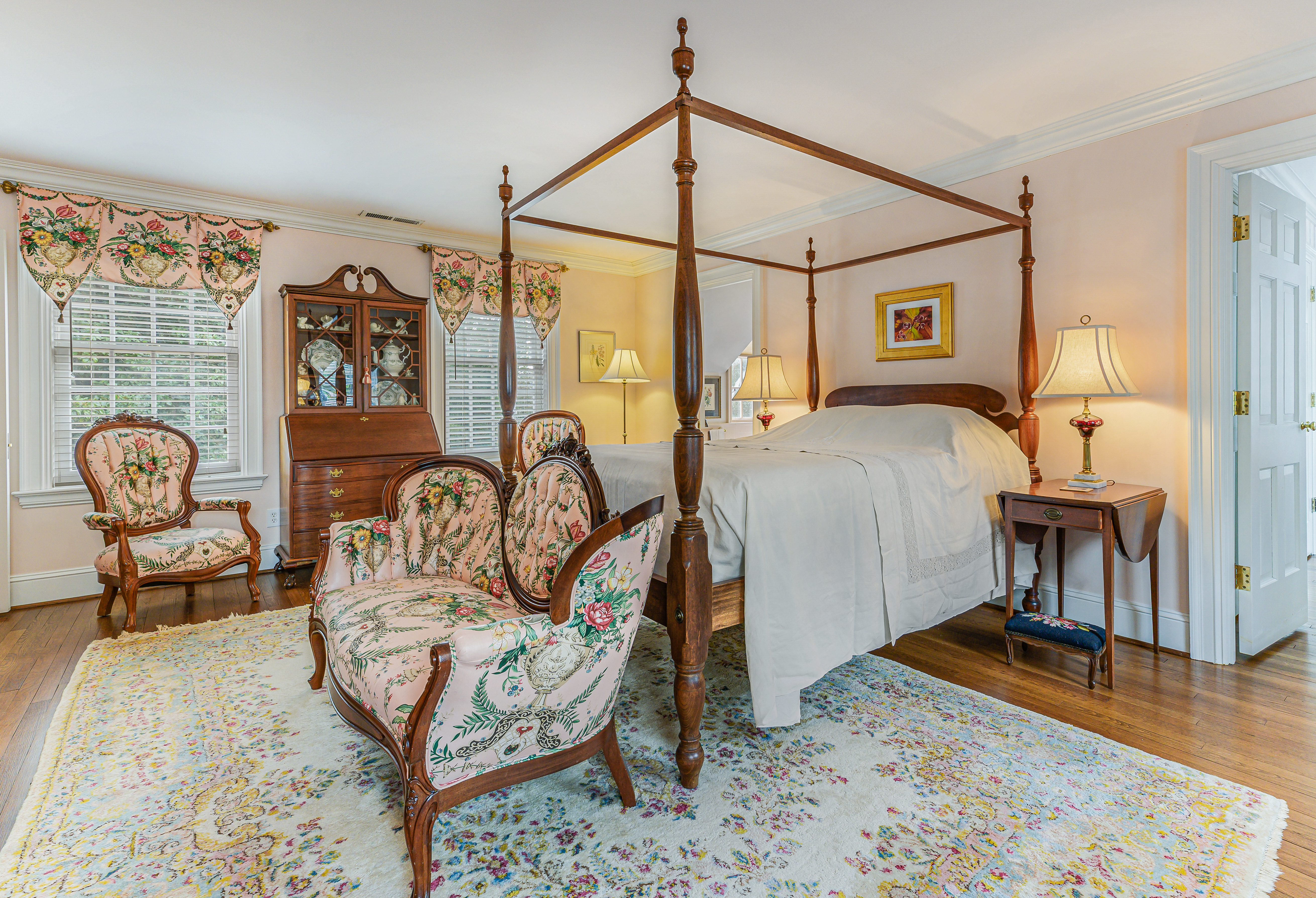 Garran Hill primary suite — sitting room, views to grounds