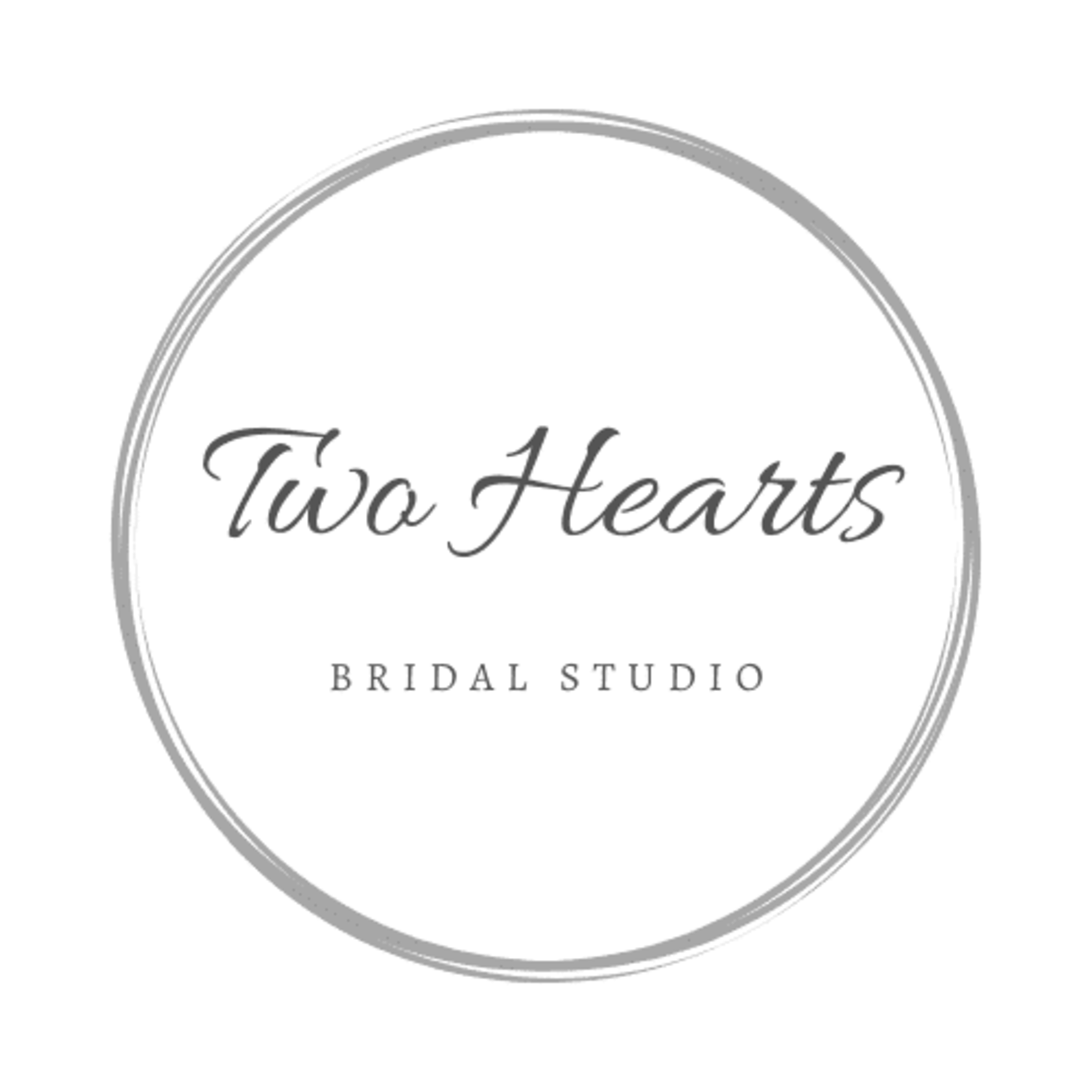 Minimal circular logo for Two Hearts Bridal Studio with elegant script text