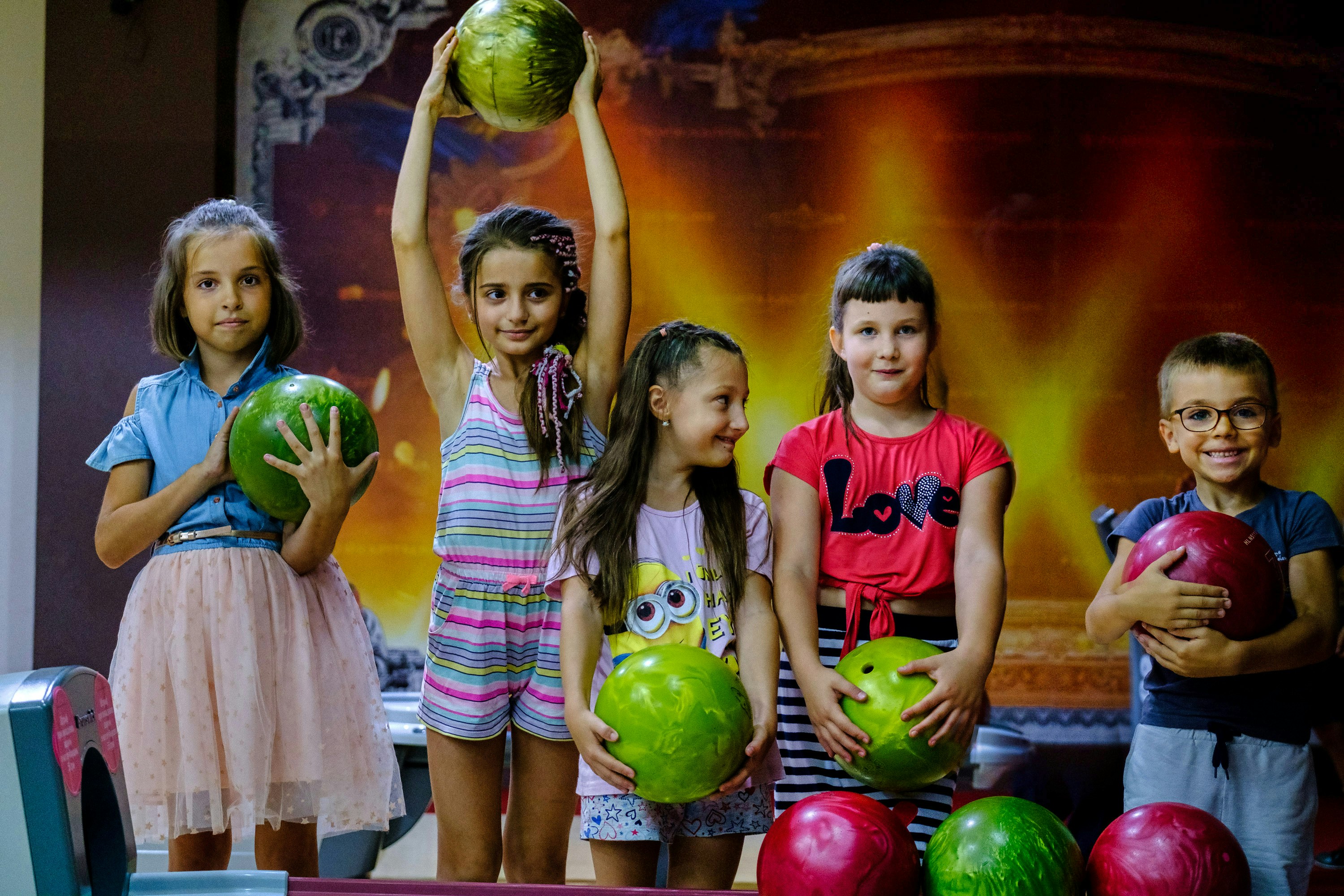 Children at a bowling party />
  <h2 class=