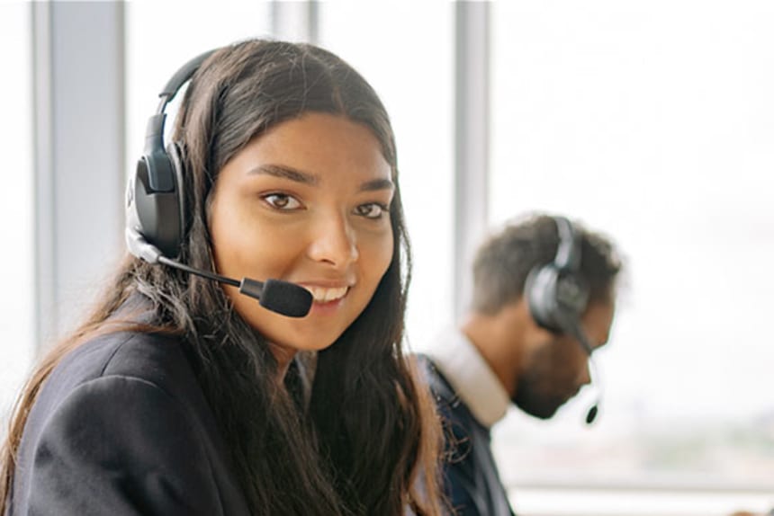 Smiling lady wearing phone headset