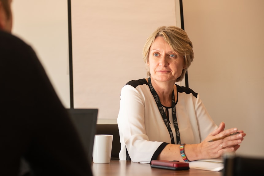 Lady sitting at desk