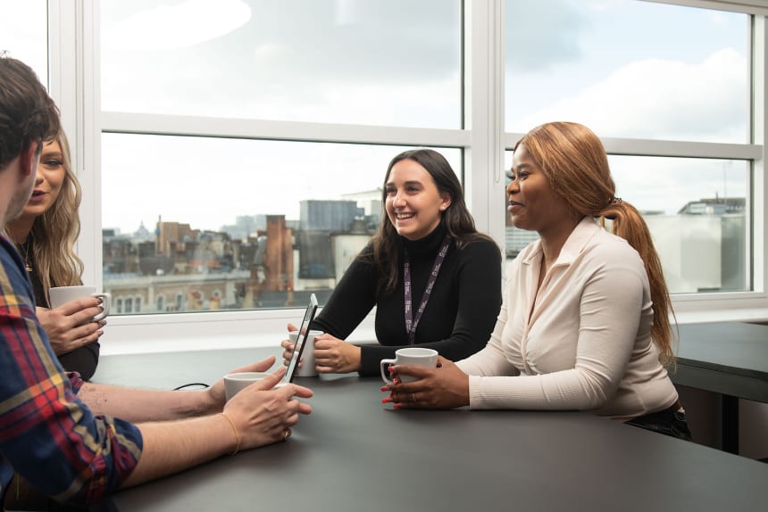 smiling group at table