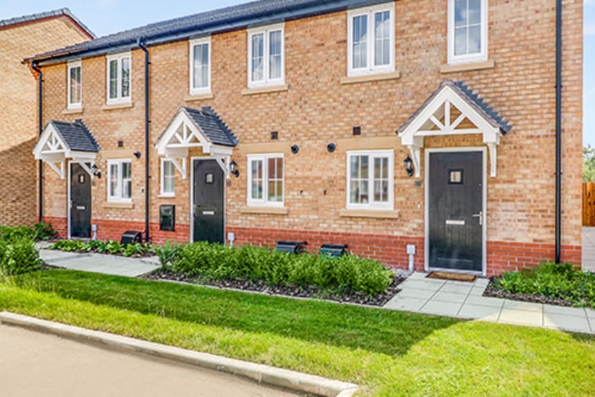 Front of three terraced homes