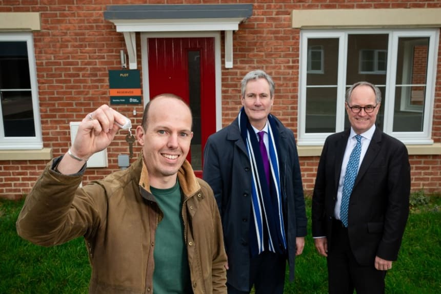 Resident holding keys for new home