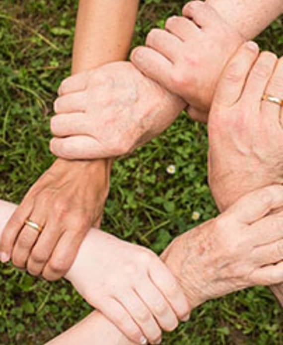 hands gripping others by the wrist