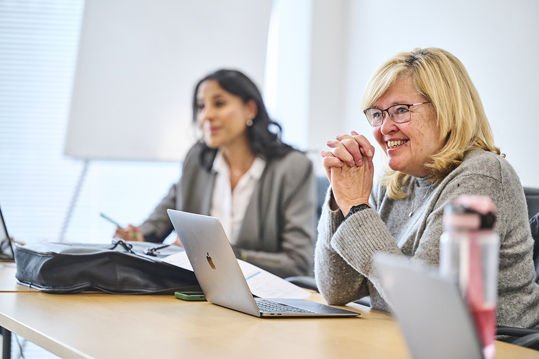 Julia smiles, as she chairs the opening session of the Customer Voice event