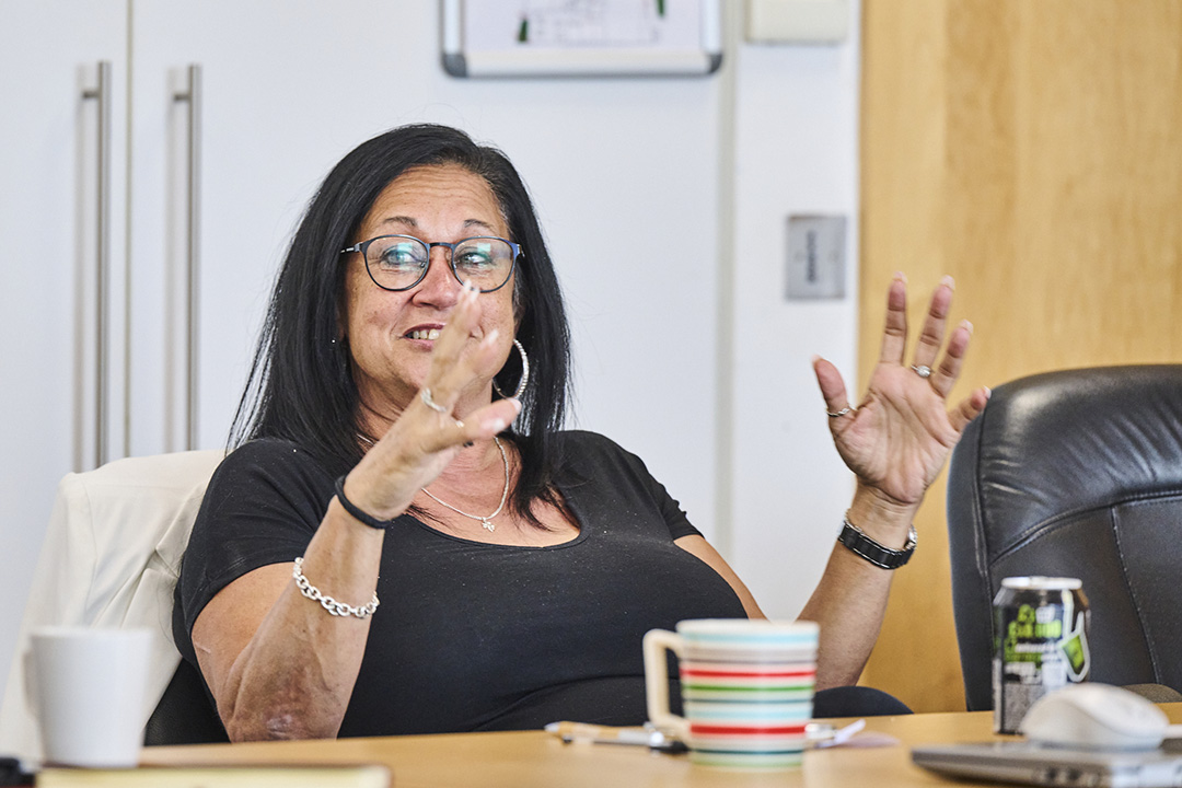 A Sage Homes customer discusses a topic at the Customer Voice event