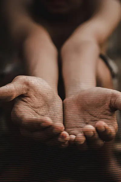 a-pair-of-hands-being-held-forward-hydrachem-humanitarian-aid
