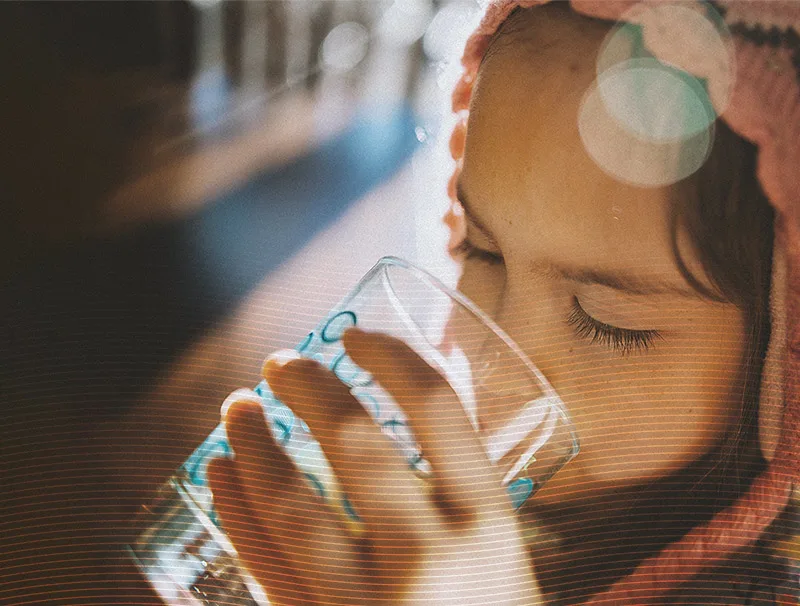 child-drinking-a-glass-of-water-purified-with-hydrachem-products