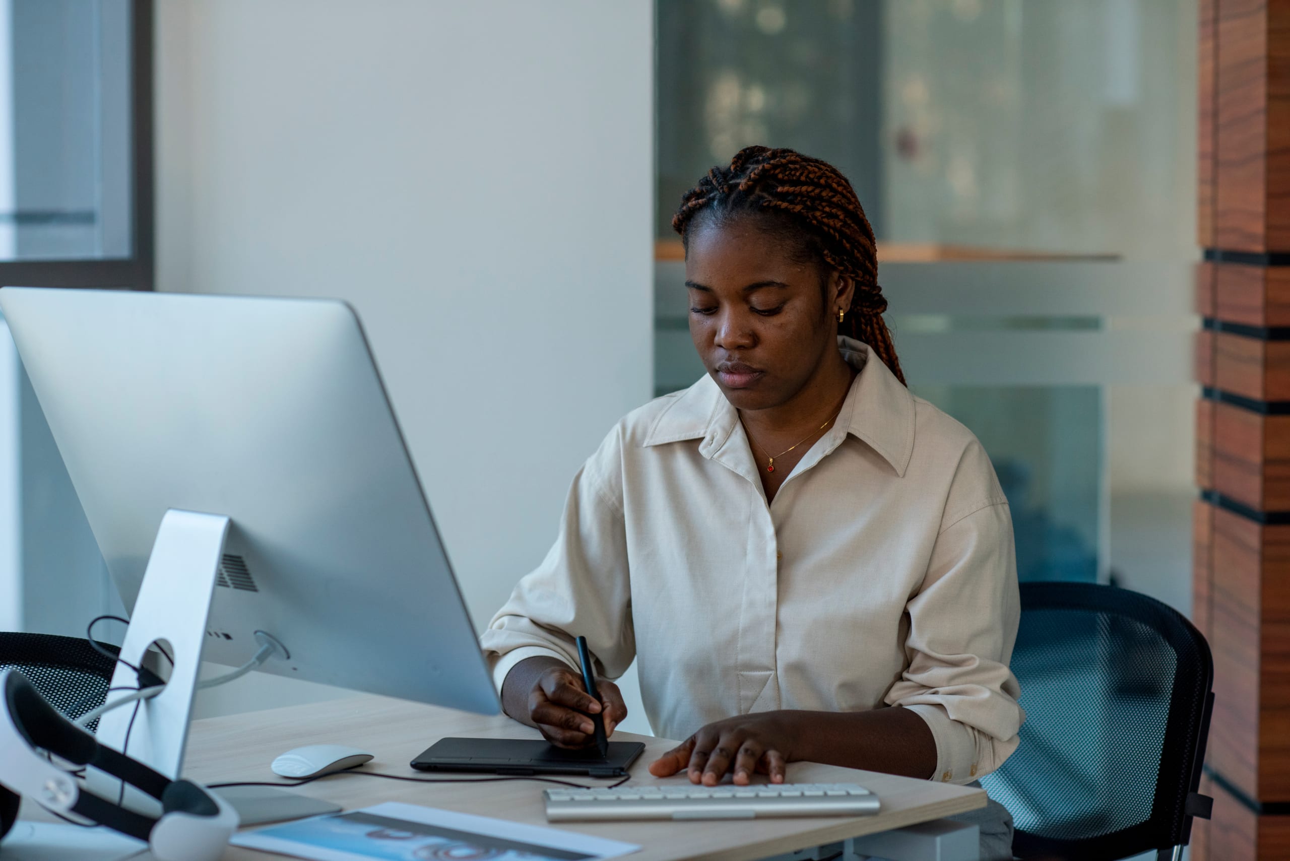 Professional woman working on tablet - Blue Sands STEM Labs partner