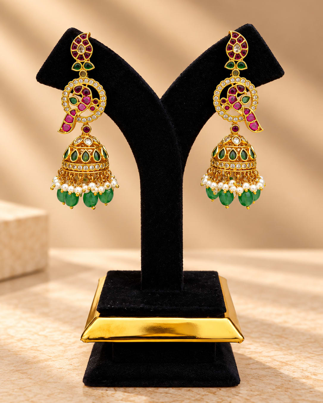 Elegant gold-toned jhumka earrings