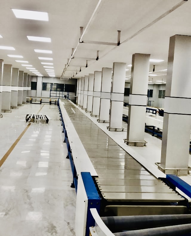 Slat Conveyor Manufacturer Noida — Farook Engineering Works
