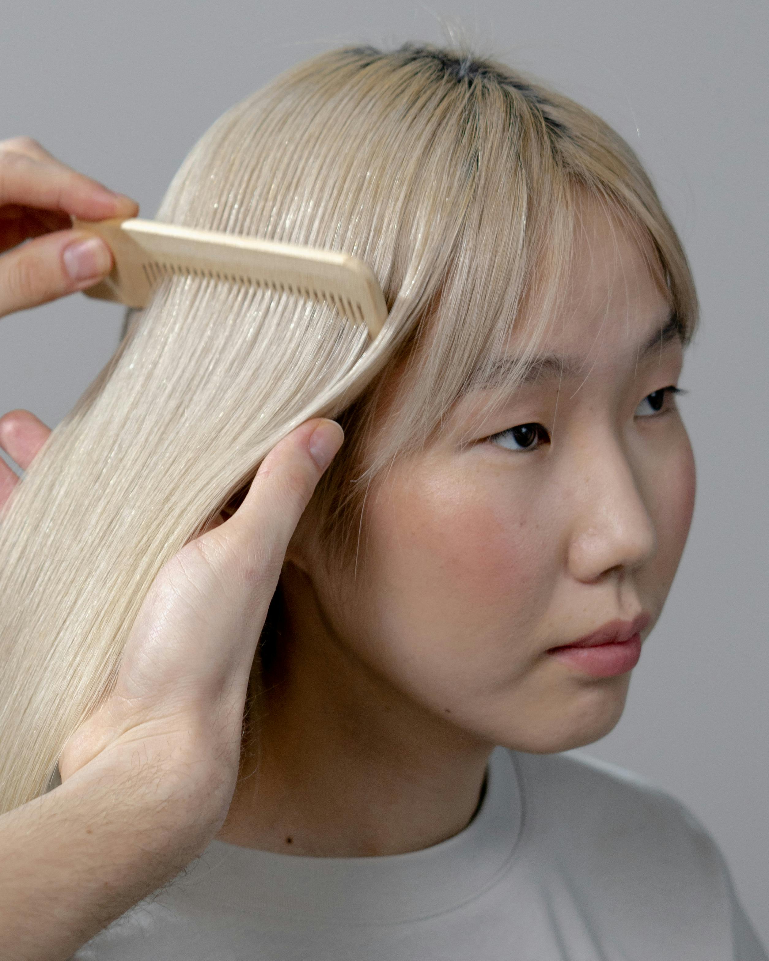Woman at night touching hair