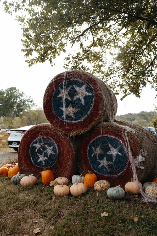 Hay bales painted with the Tennessee tri-star, stacked with pumpkins
