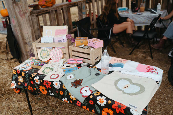 Craft vendor table with handmade goods