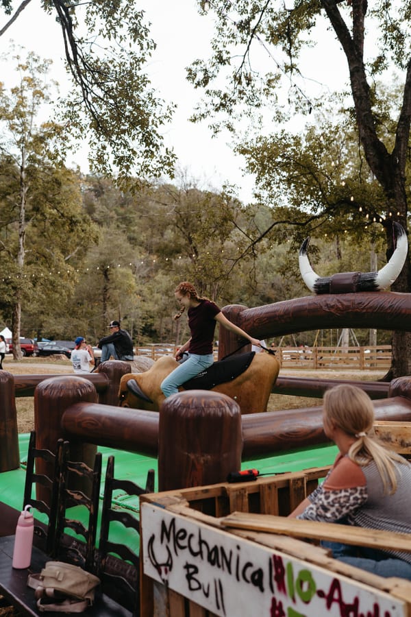 Guest riding the mechanical bull