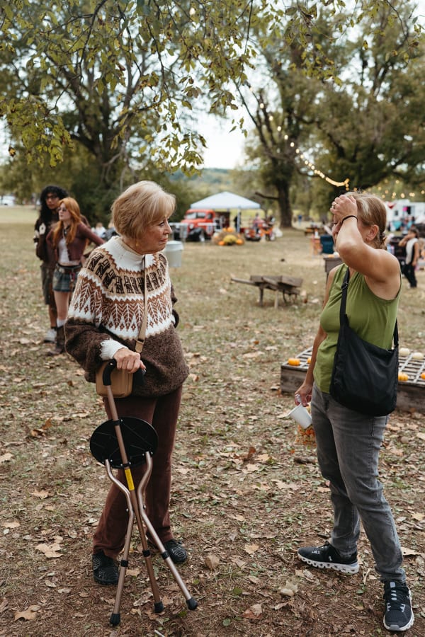Two friends walking the festival grounds