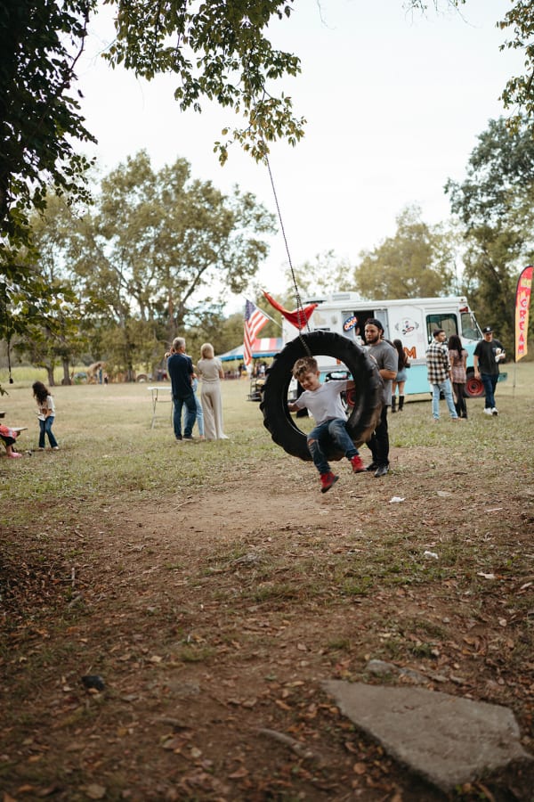 Child on the tire swing