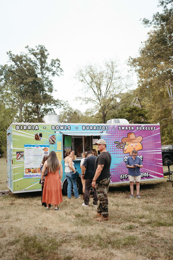 Guests ordering from the food trucks