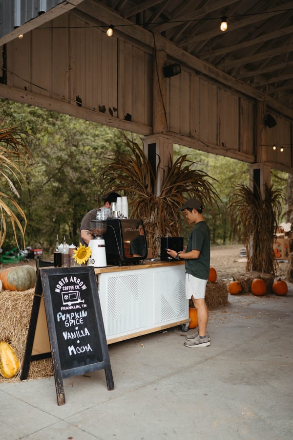 Coffee bar under the pavilion with its chalkboard menu