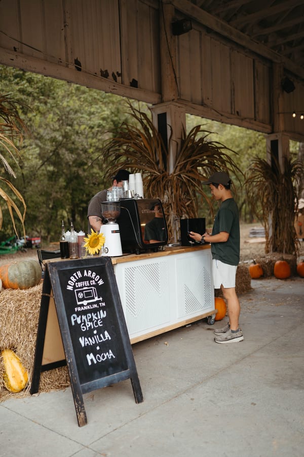 Coffee bar under the pavilion with its chalkboard menu