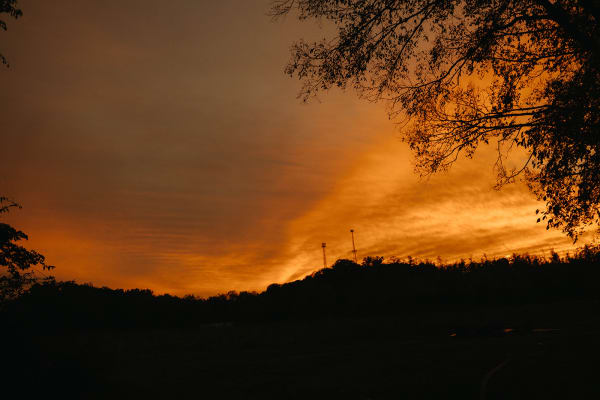 Orange sunset over the farm