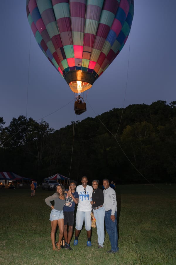 Hot air balloon glowing at dusk