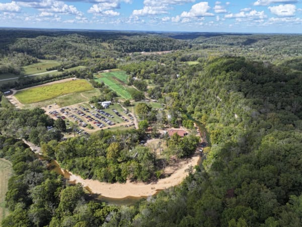 Aerial view of the farm tucked in the river bend