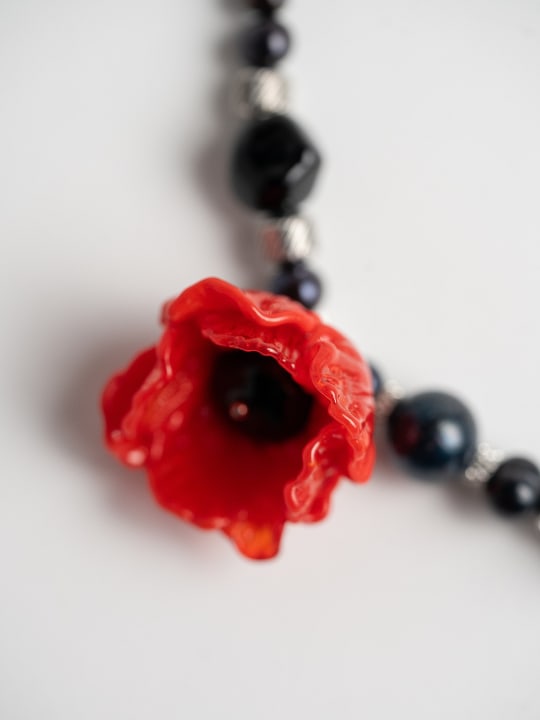 Necklace “Midnight Poppy”  hovered