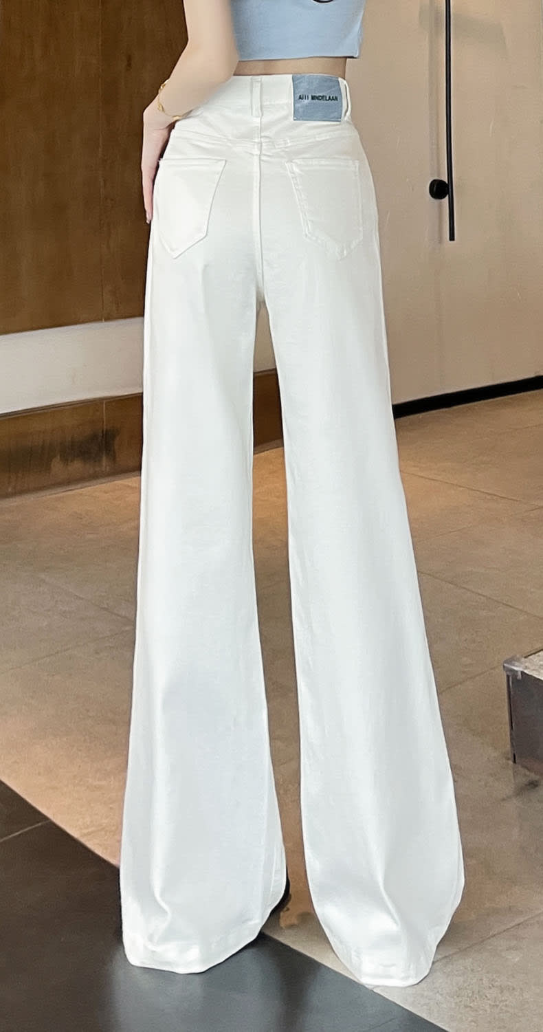 YEEYEEWang Flare Jeans, Asian-fit cut, full back view with sculpted high-rise waistband, clean patch pockets and smooth full-length drape.