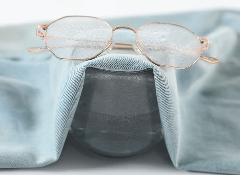 YEEYEEWang wide-leg jeans, Asian-fit cut, fabric over steaming cup with vapor visibly fogging eyeglass lenses above the weave.