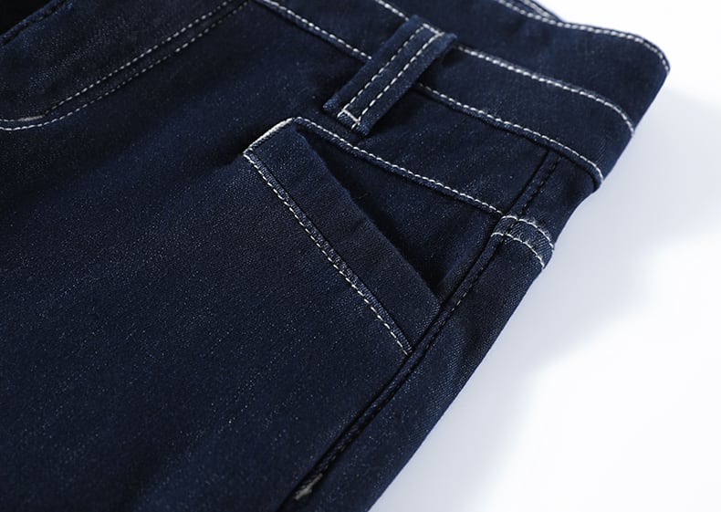 YEEYEEWang wide-leg jeans, Asian-fit cut, close-up of waistband with contrast topstitching, belt loops and pocket edge on deep indigo denim.