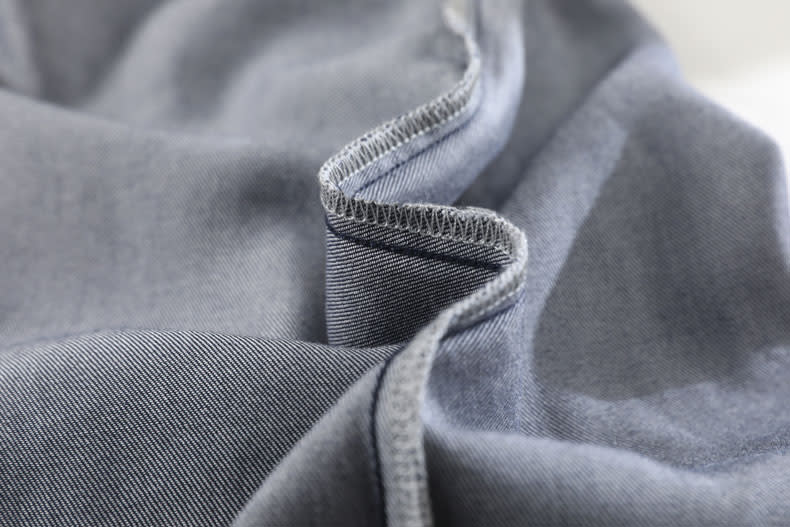 YEEYEEWang Wide-Leg Jeans in Denim Blue, Asian-fit cut, inside-out close view with neat overlocked seams and smooth unlined interior.