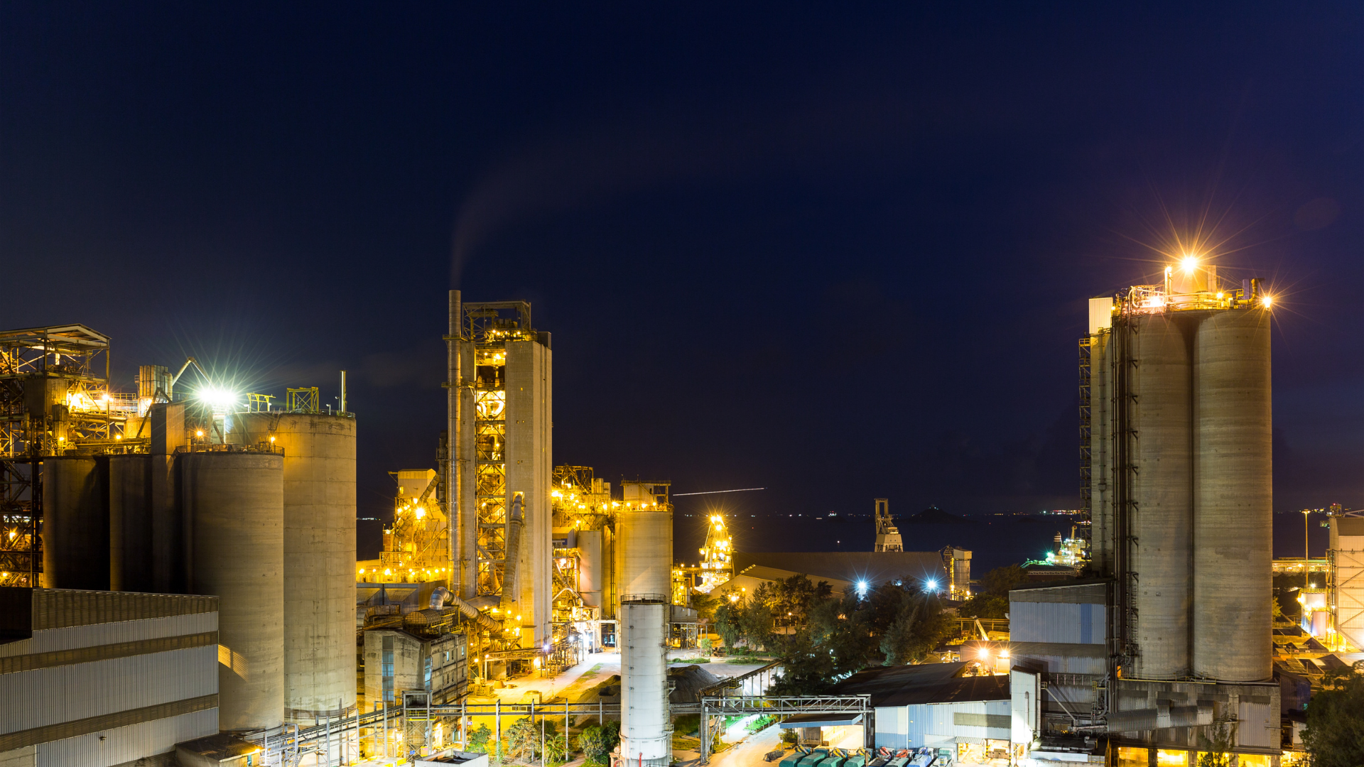 Industrial operator reviewing plant optimization and SOP workflows